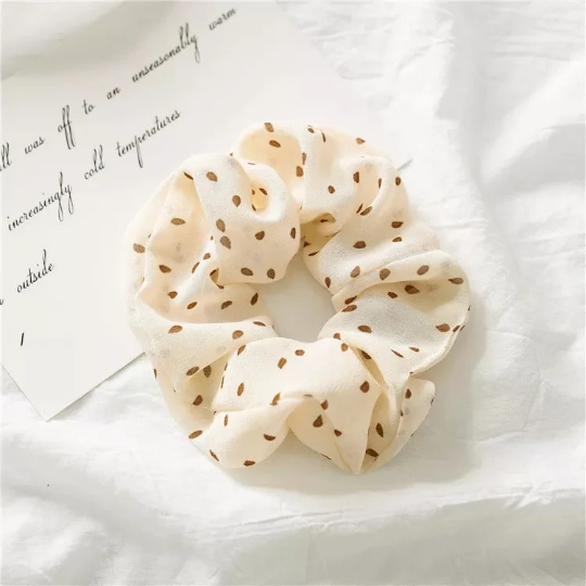 Cute Dot Scrunchie in green and beige chiffon with polka dots, perfect for stylish hair accessories.