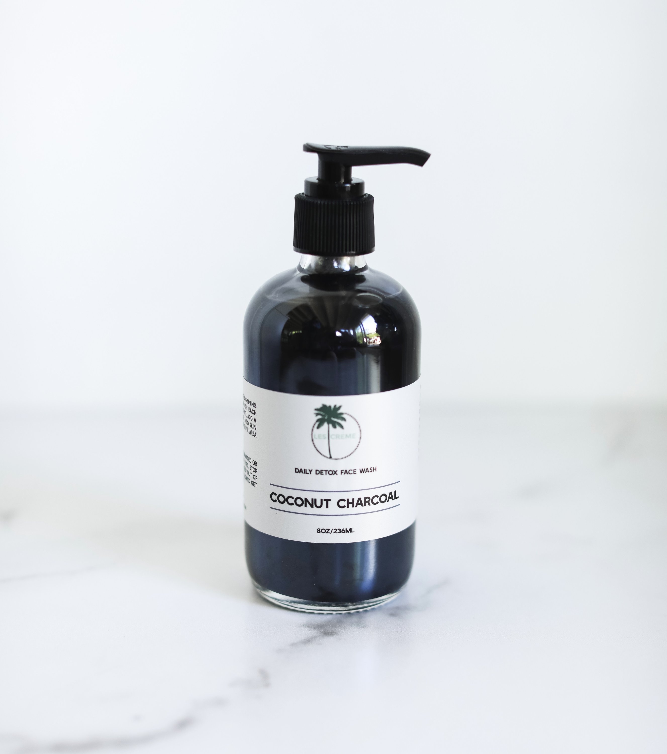 Daily Detox Face Wash bottle with charcoal ingredients, showcasing its natural and vegan formula.