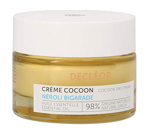 Decléor Neroli Bigarade Cocoon Day Cream in a sleek jar, showcasing its luxurious texture and vibrant packaging.