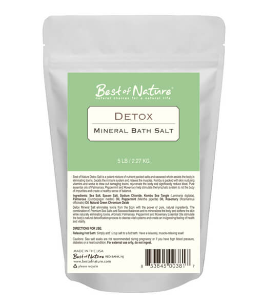 Detox Mineral Bath Salt in a shaker-top container, showcasing its natural ingredients and vibrant texture.