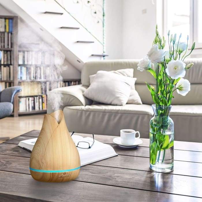 A sleek 500ml essential oil diffuser with LED lights, designed for aromatherapy and humidifying.