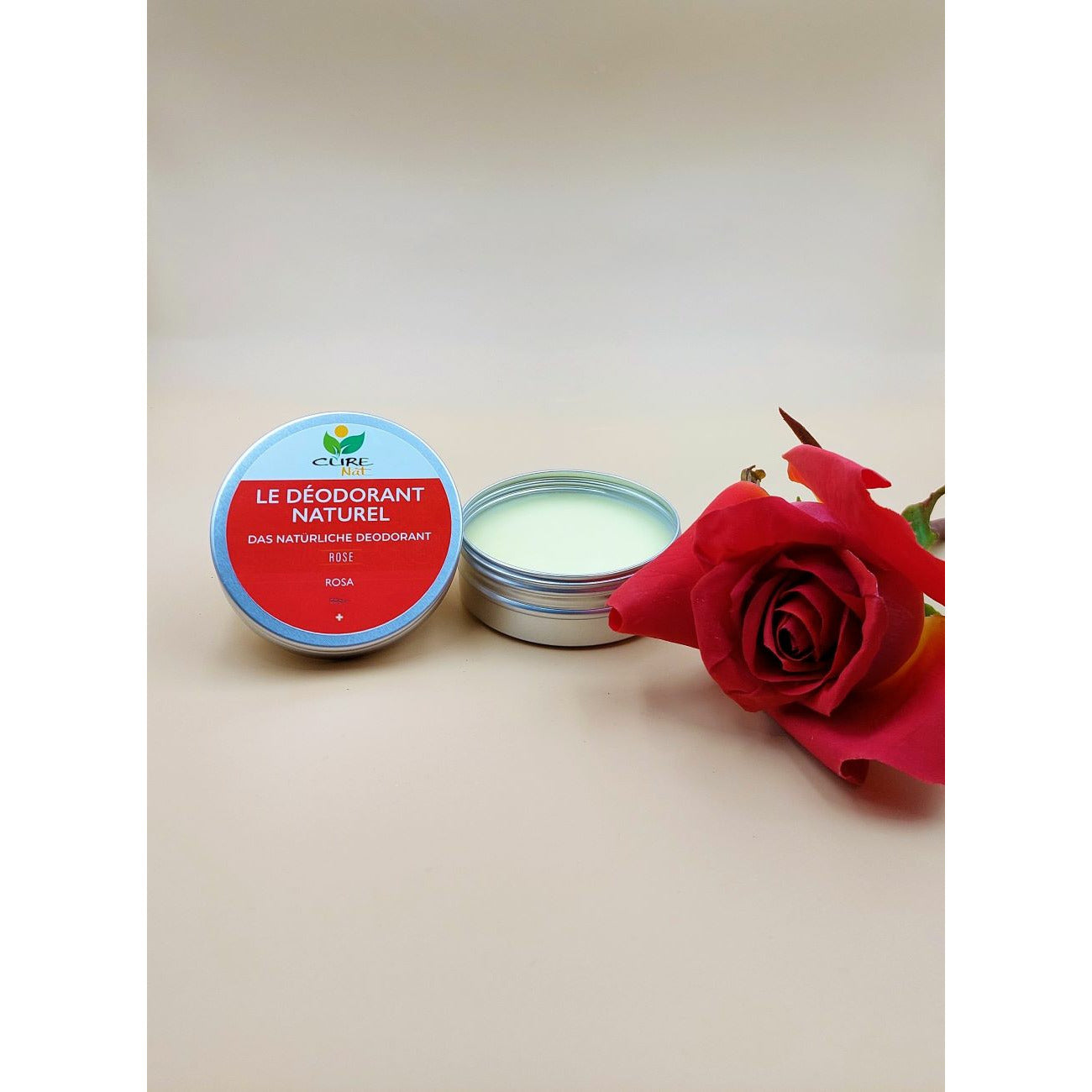 A beautifully packaged Déodorant Rose in an aluminum container, showcasing its natural ingredients and delicate rose scent.