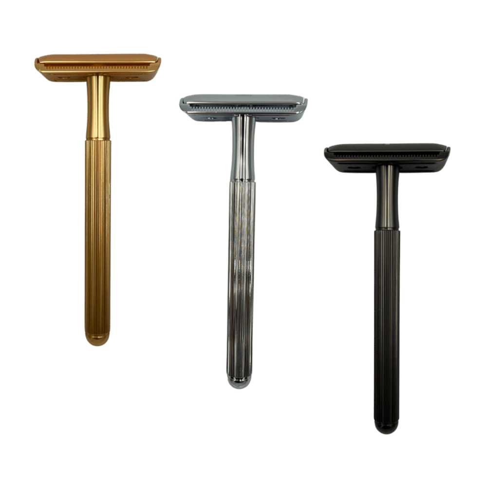 Double-Sided Safety Razor V2 with brass handle, covered tabs, and vertical ridges, available in silver, black, and gold.