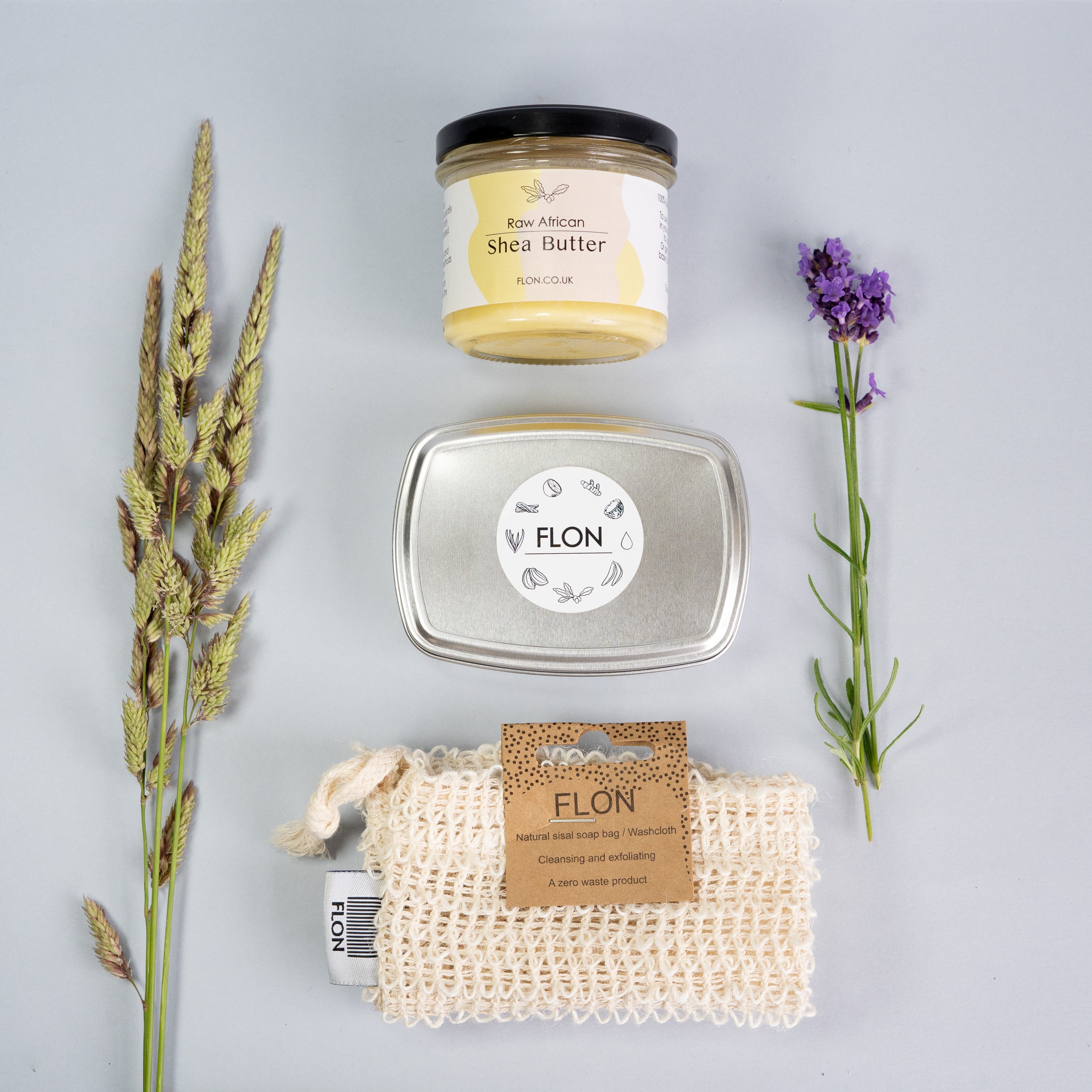 Eco Body Gift Set featuring Shea Butter, African Black Soap, and Sisal Wash Cloth in eco-friendly packaging.