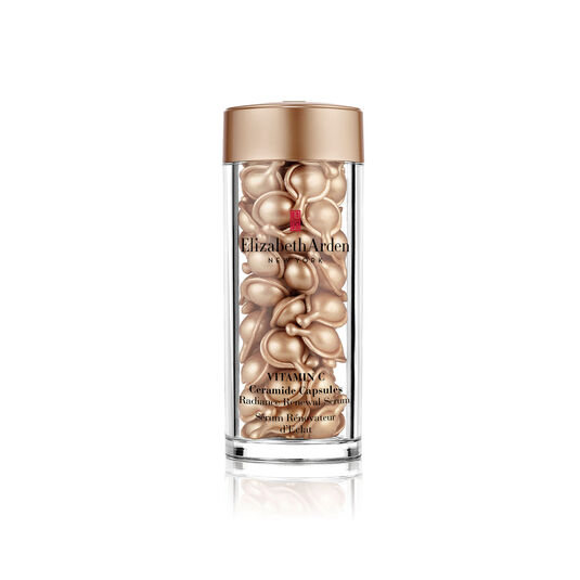 Elizabeth Arden Vitamin C Ceramide Capsules in a sleek container, showcasing the vibrant orange capsules designed for skin radiance.