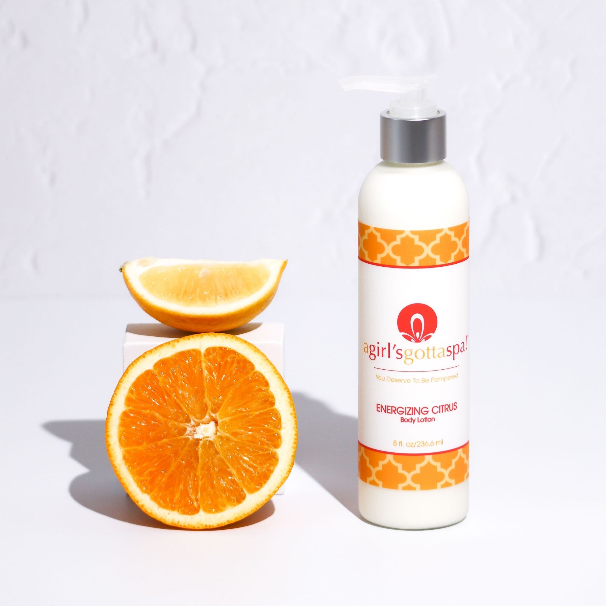 A bottle of Energizing Citrus Body Lotion with a vibrant citrus design, showcasing its refreshing and hydrating properties.