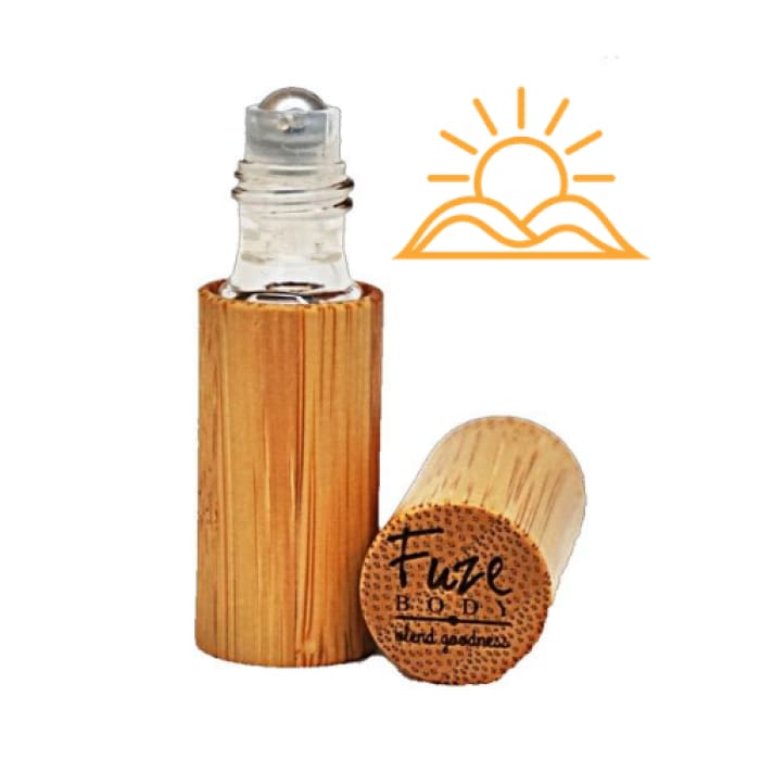 A roll-on bottle of Energy Pure Essential Oils featuring orange and ginger, designed for energy and alertness.