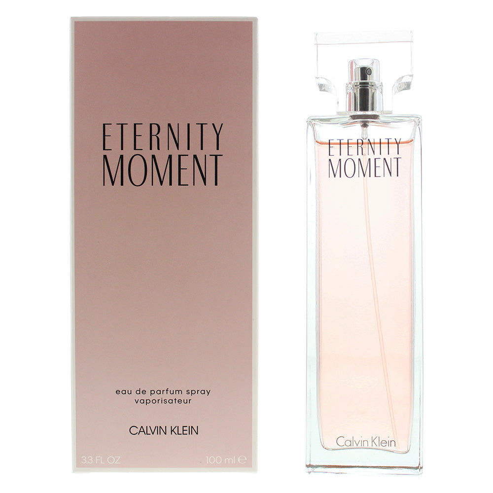 Bottle of Calvin Klein Eternity Moment Eau de Parfum with floral design.