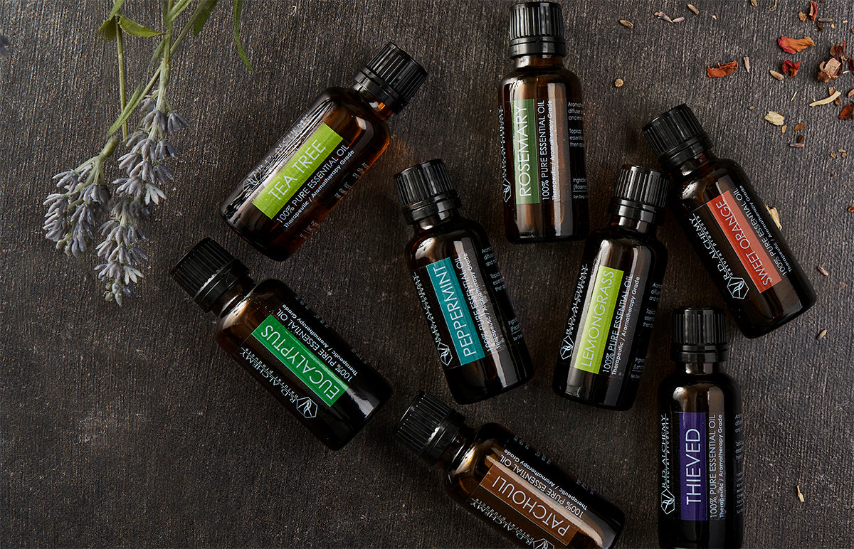 A bottle of 100% pure eucalyptus essential oil with a green label, surrounded by eucalyptus leaves, showcasing its natural and therapeutic qualities.