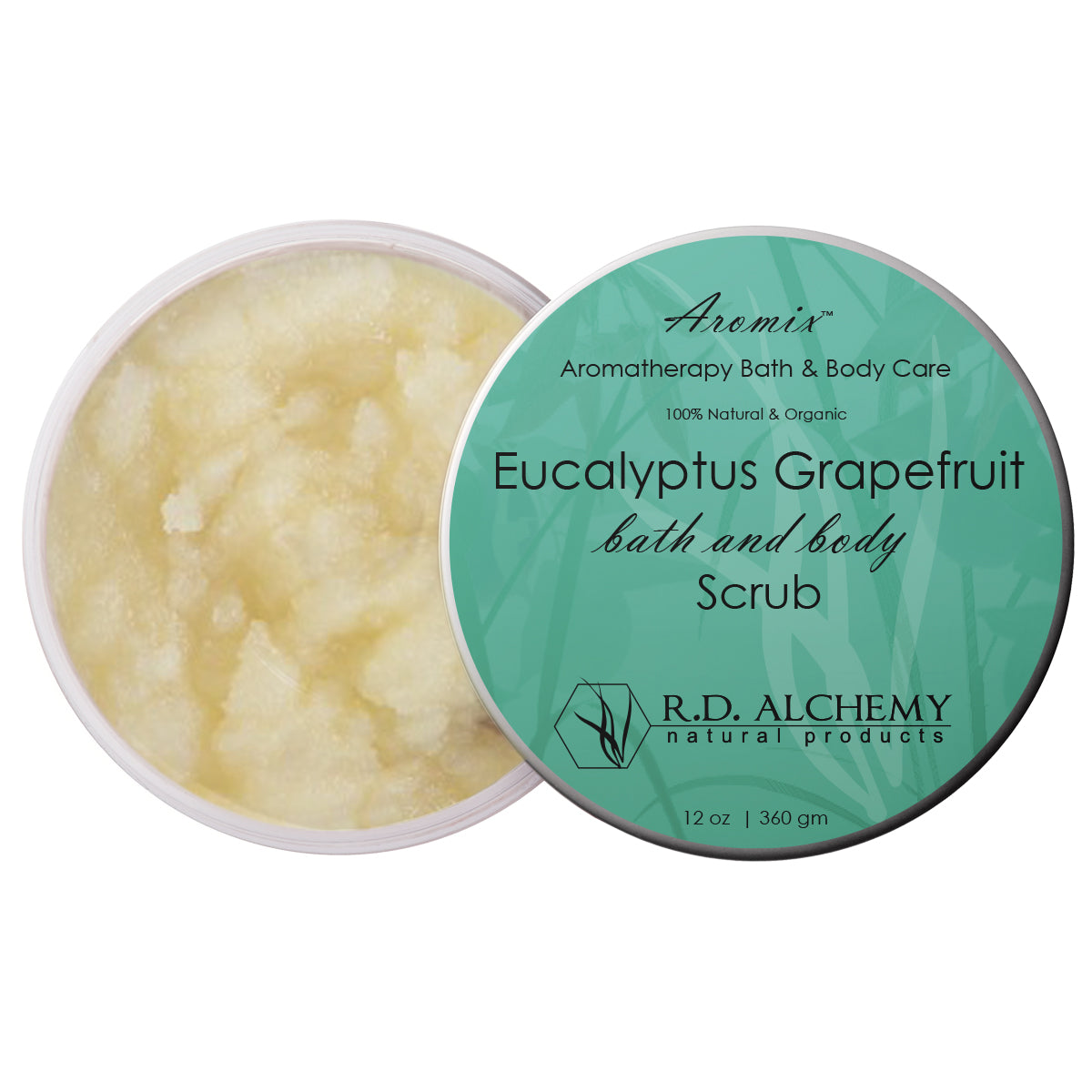 Eucalyptus Grapefruit Sea Salt Body Scrub in a clear jar with a wooden spoon, surrounded by eucalyptus leaves and grapefruit slices.