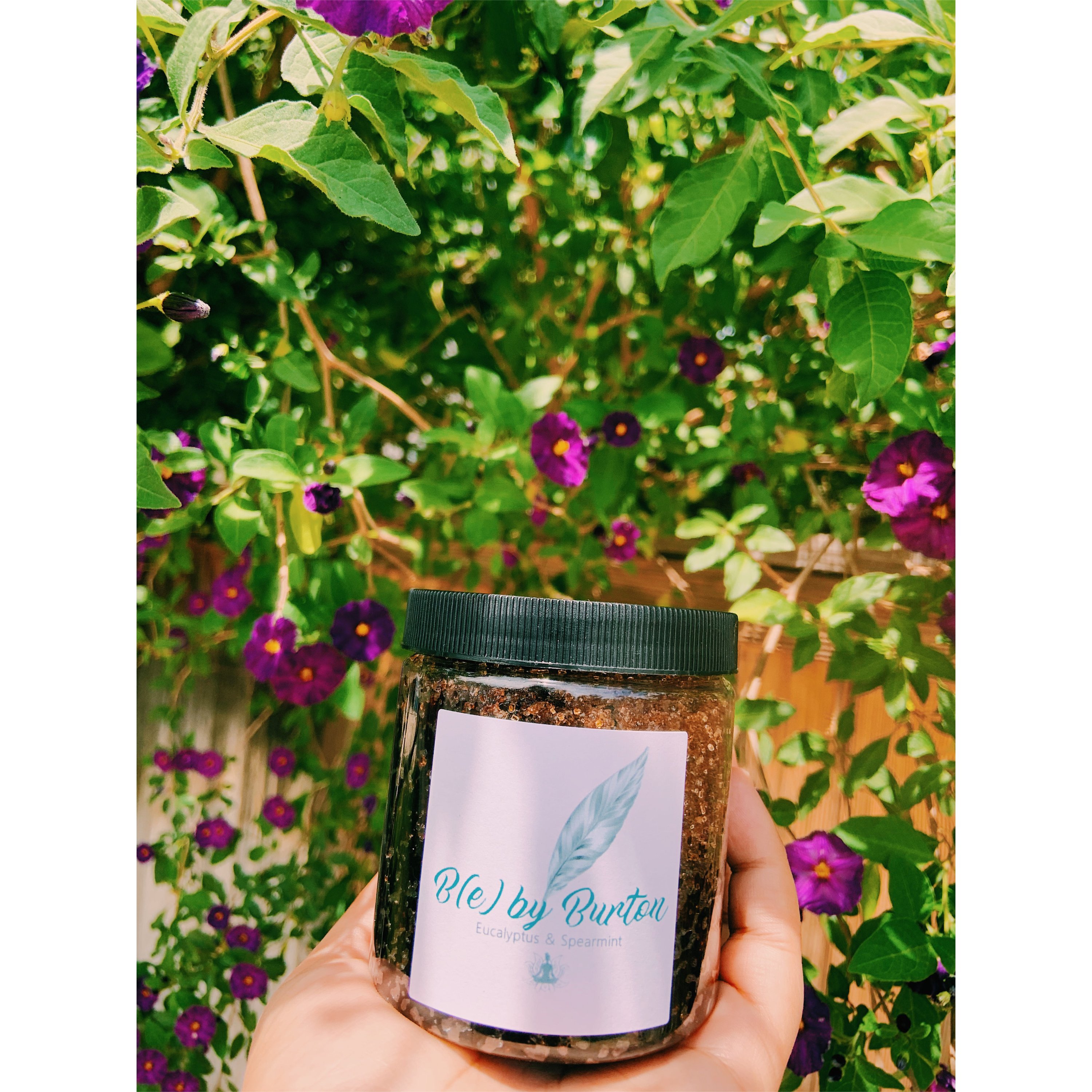 Eucalyptus & Spearmint Sugar Scrub in an 8oz jar, showcasing its rich brown color and organic ingredients.