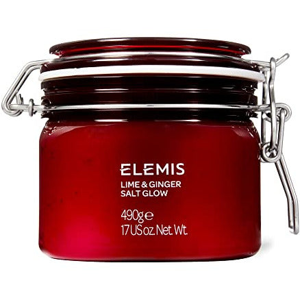 A jar of Elemis Exotic Lime & Ginger Salt Glow with a vibrant green and yellow label, showcasing the luxurious exfoliating body scrub inside.