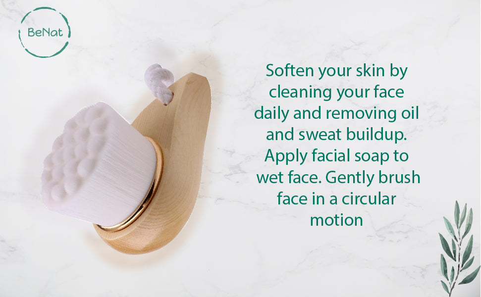 Facial brush with a bamboo handle and soft bristles, ideal for gentle exfoliation and cleansing of the face.