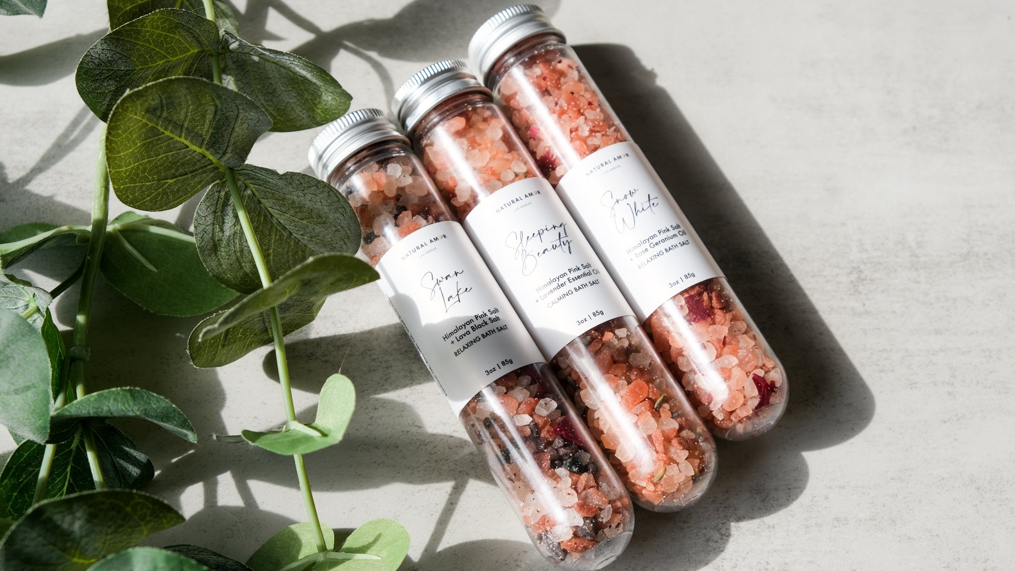 Fairy Tale Tube Bath Salt Gift Set featuring colorful tubes with natural ingredients and dried flowers for a relaxing bath experience.