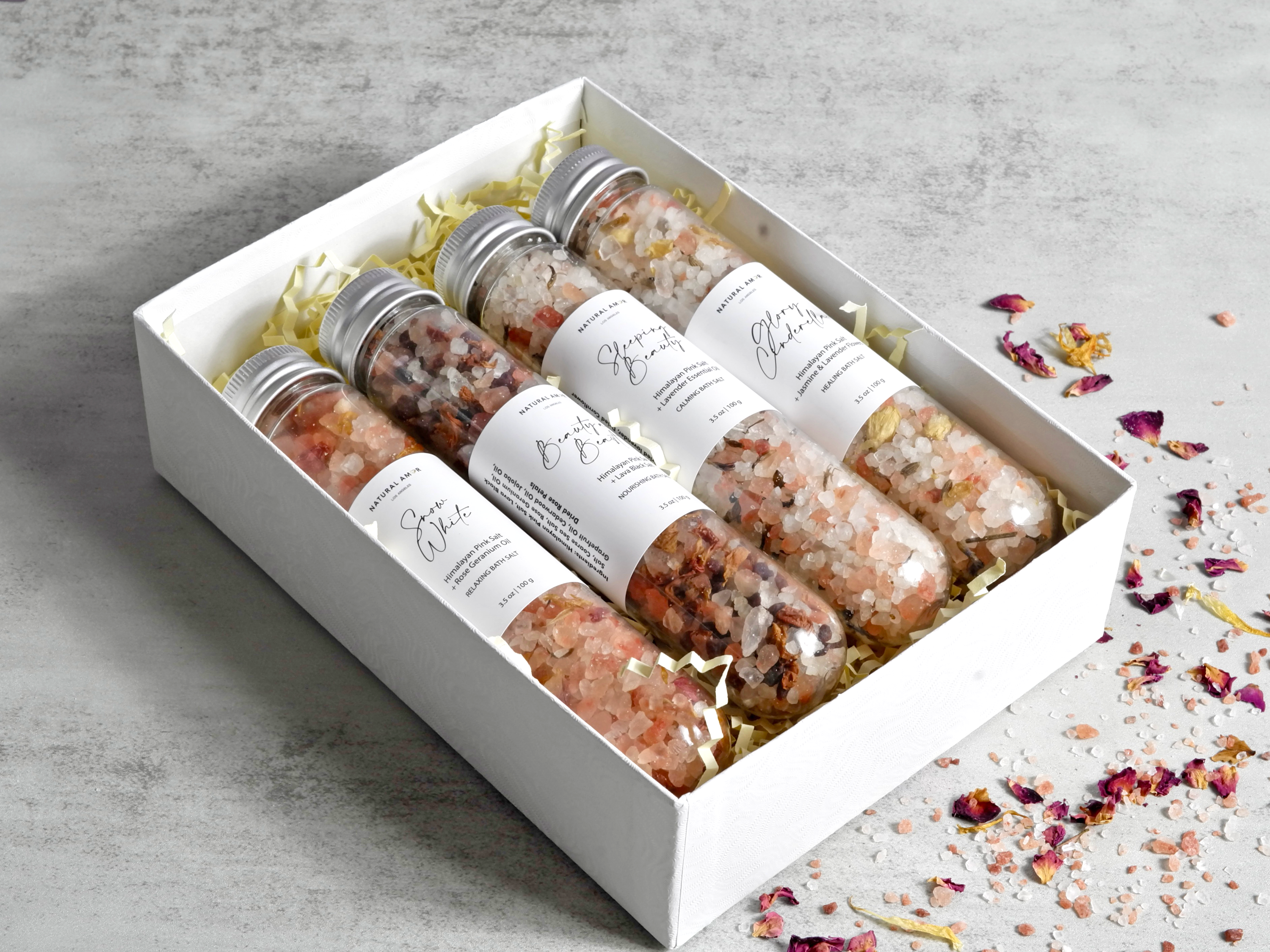 Fairy Tale Tube Bath Salt Gift Set featuring colorful tubes with natural ingredients and dried flowers for a relaxing bath experience.