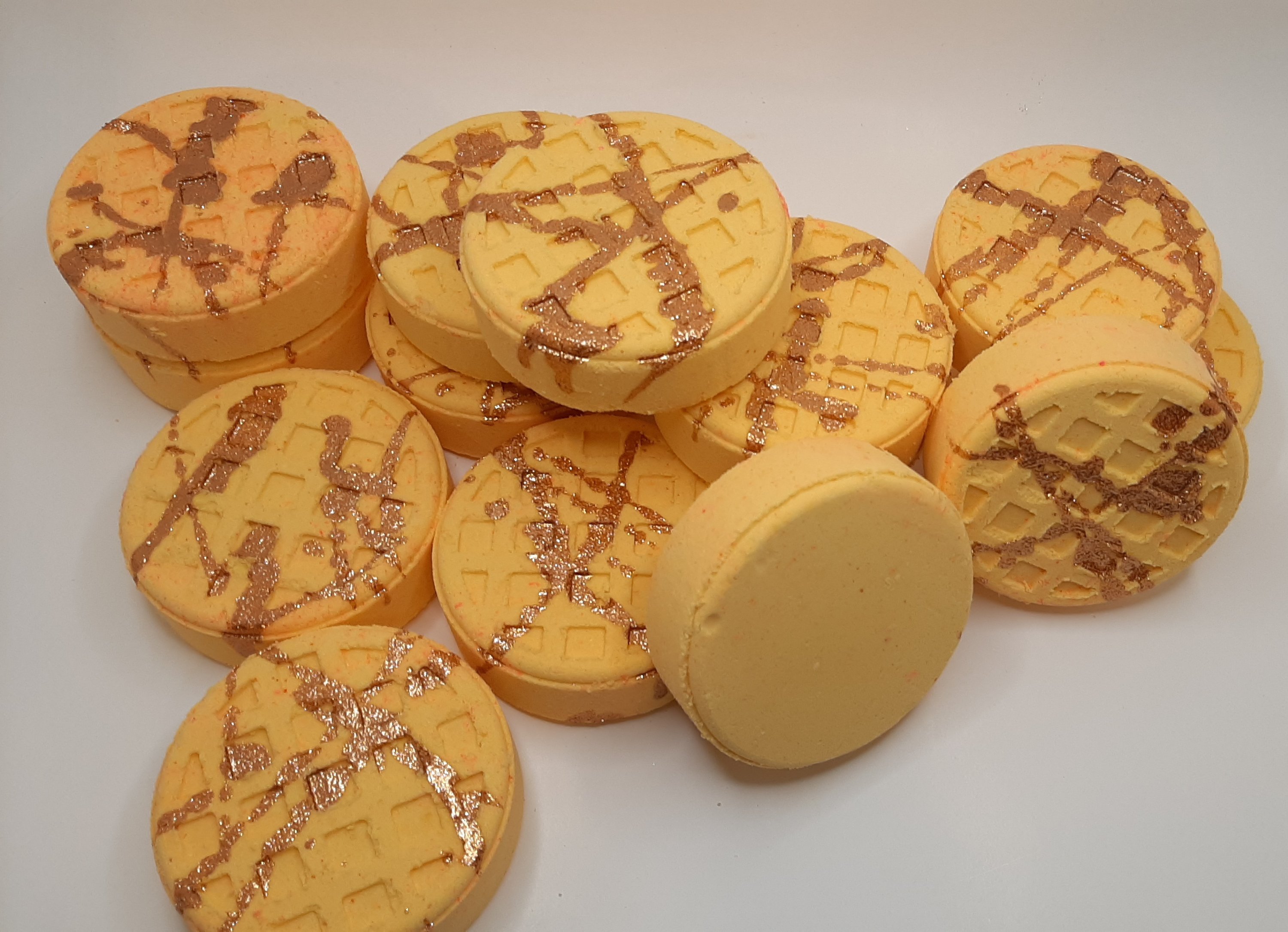 Fall Festival Waffles Bath Bomb with vibrant orange and pink colors, resembling autumn treats, perfect for a cozy bath experience.