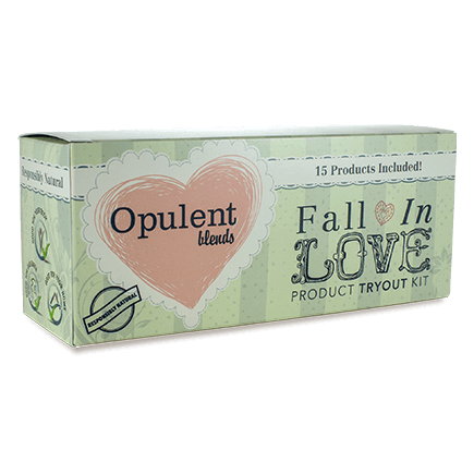 Fall In Love Kit featuring various personal care products including shampoo, conditioner, body wash, and retail-sized items.