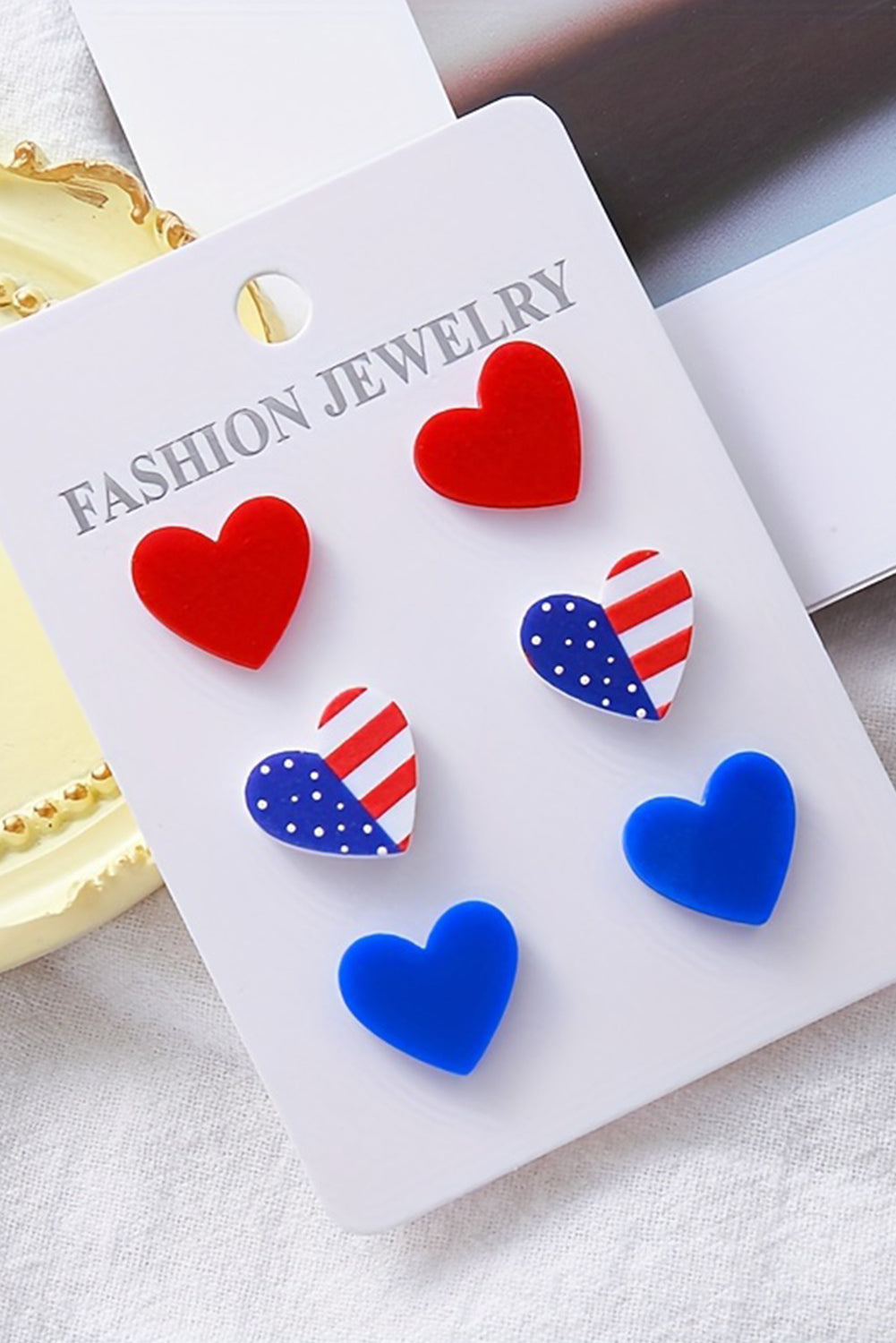 Fiery Red American Flag Print Heart Shape Stud Earrings Set displayed on a white background, showcasing their vibrant colors and unique heart shape.