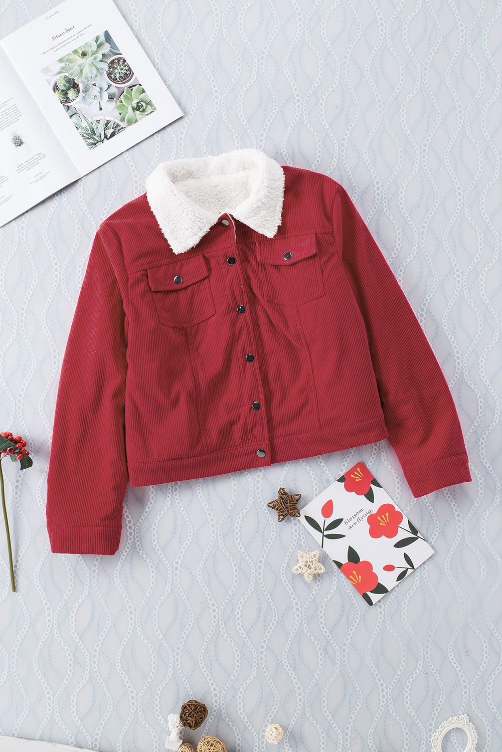 Fiery Red Corduroy Sherpa Snap Button Flap Jacket with fleece lining and snap button closure, showcasing stylish flap details.