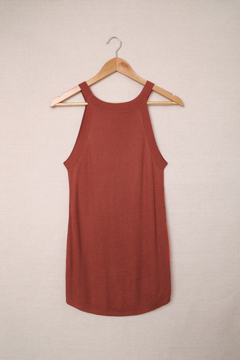 Fiery red solid ribbed knit slim-fit tank top displayed on a mannequin, showcasing its stylish design and texture.