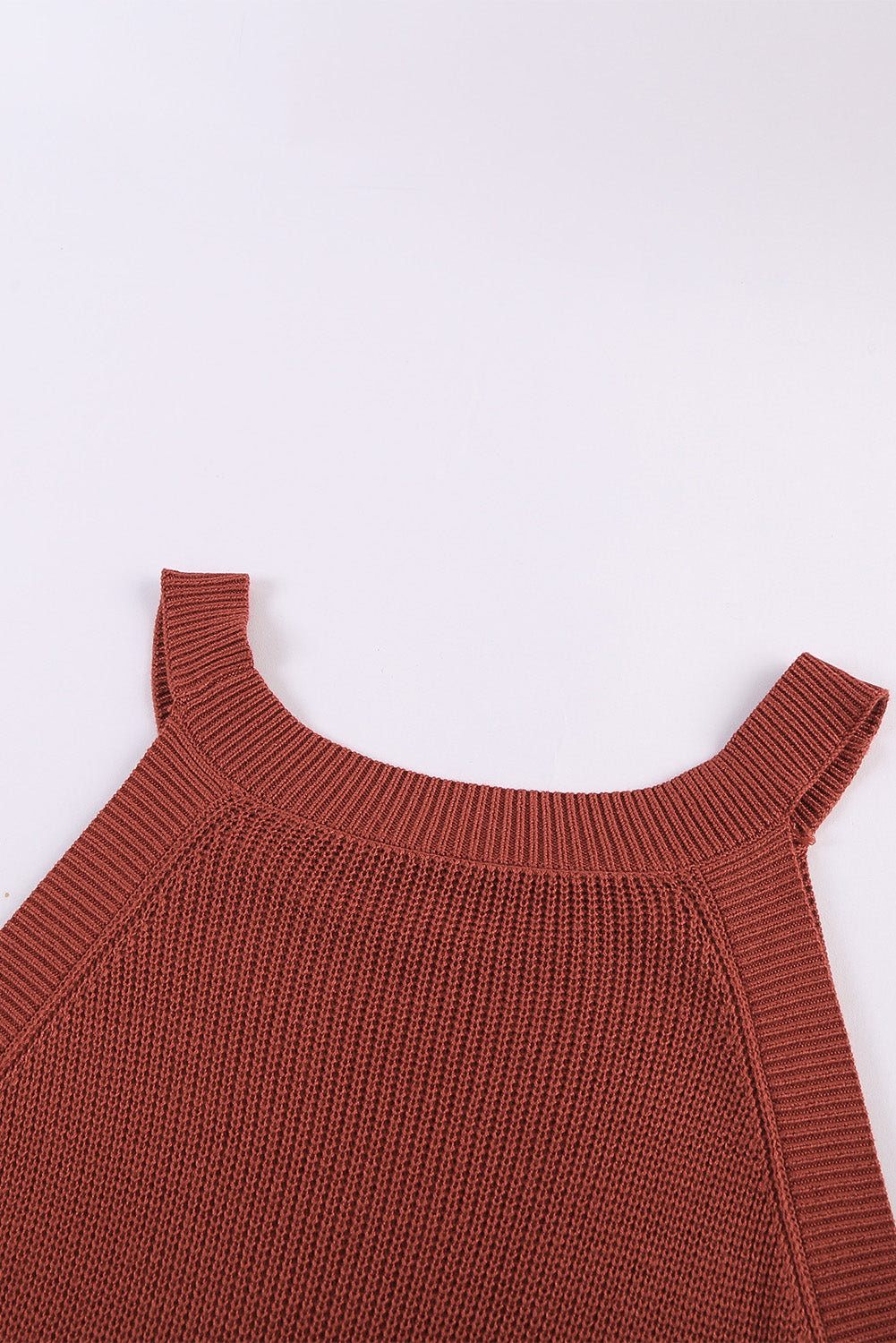 Fiery red solid ribbed knit slim-fit tank top displayed on a mannequin, showcasing its stylish design and texture.