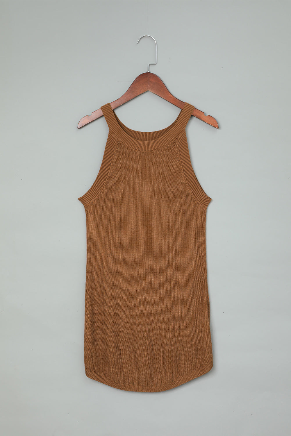 Fiery red solid ribbed knit slim-fit tank top displayed on a mannequin, showcasing its stylish design and texture.