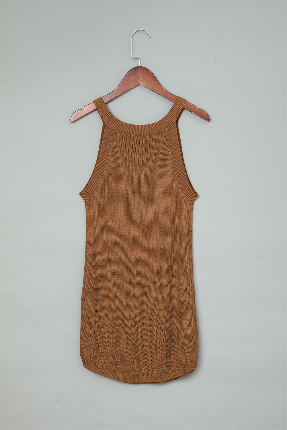 Fiery red solid ribbed knit slim-fit tank top displayed on a mannequin, showcasing its stylish design and texture.