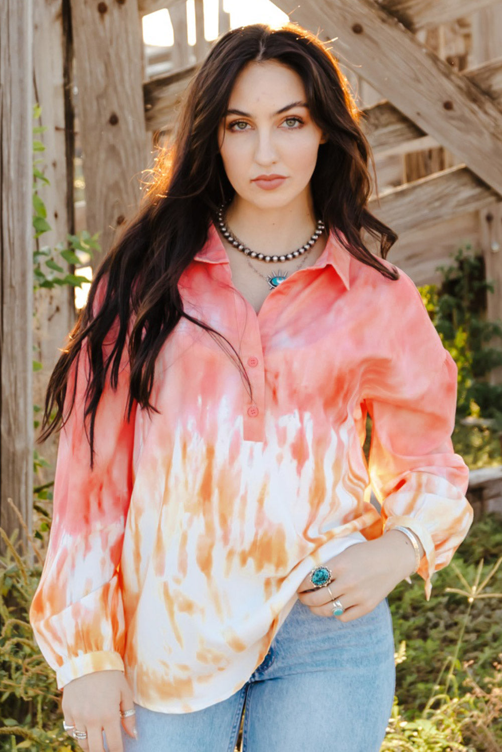 Fiery Red Tie Dye Print Lace-up Buttoned Henley Top displayed on a mannequin, showcasing its vibrant colors and unique back design.