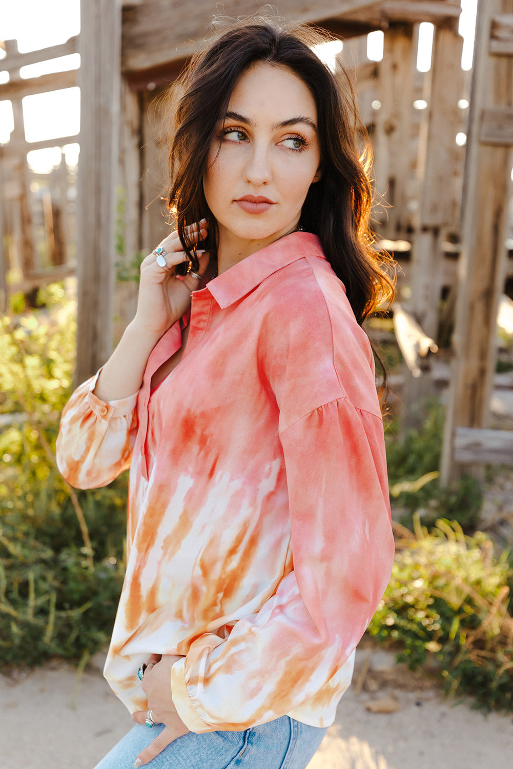 Fiery Red Tie Dye Print Lace-up Buttoned Henley Top displayed on a mannequin, showcasing its vibrant colors and unique back design.