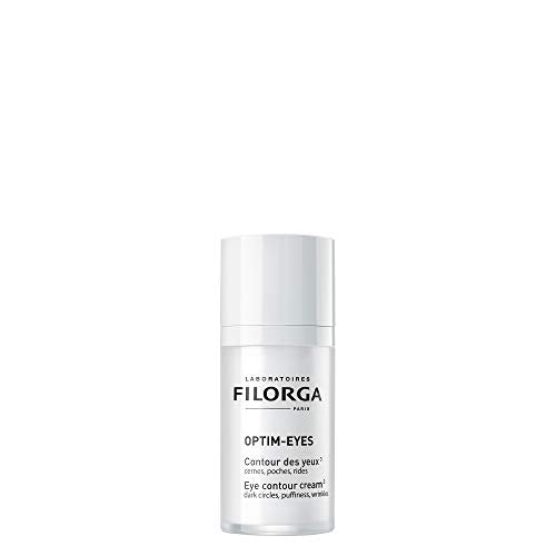 Filorga Optim-Eyes Eye Contour cream in a sleek jar, designed for reducing dark circles and puffiness around the eyes.