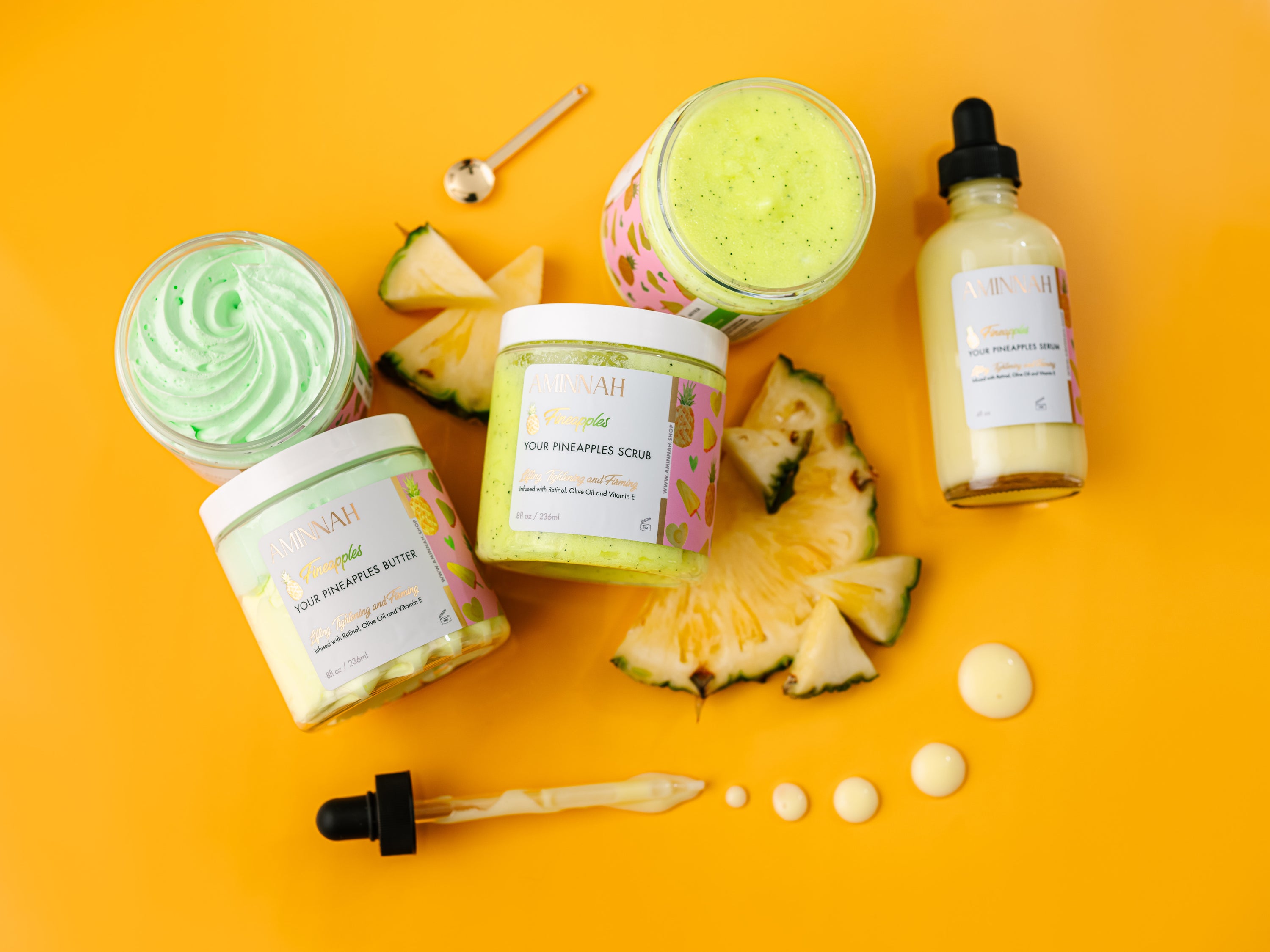 Fineapples Boob Collection featuring body butter, serum, and sugar scrub with pineapple and Vitamin E ingredients.