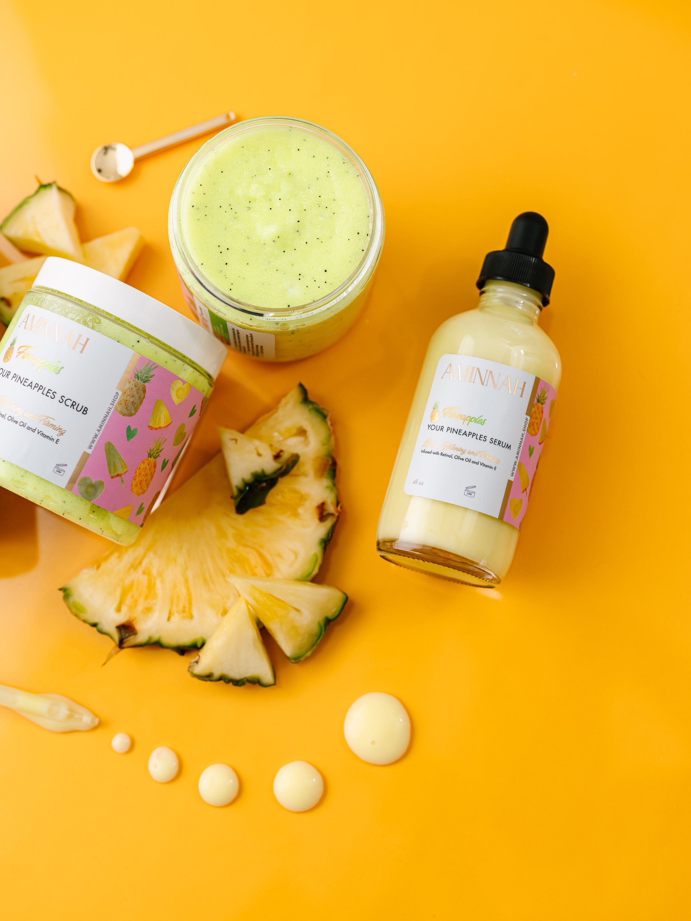 Fineapples Boob Collection featuring body butter, serum, and sugar scrub with pineapple and Vitamin E ingredients.