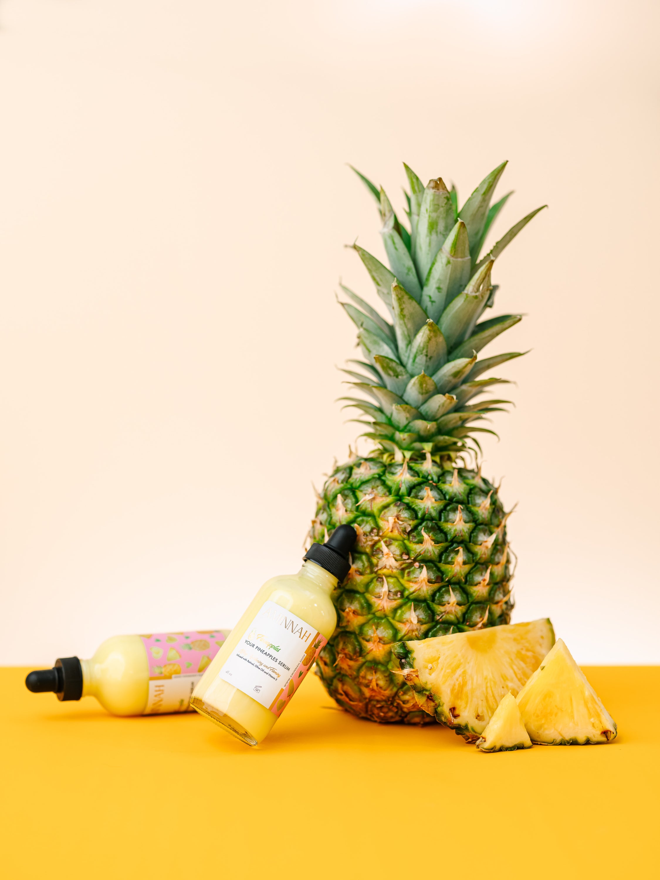 Fineapples Boob Serum bottle with pineapple fruit extract, retinol, and vitamin E ingredients, designed for skin tightening and firming.