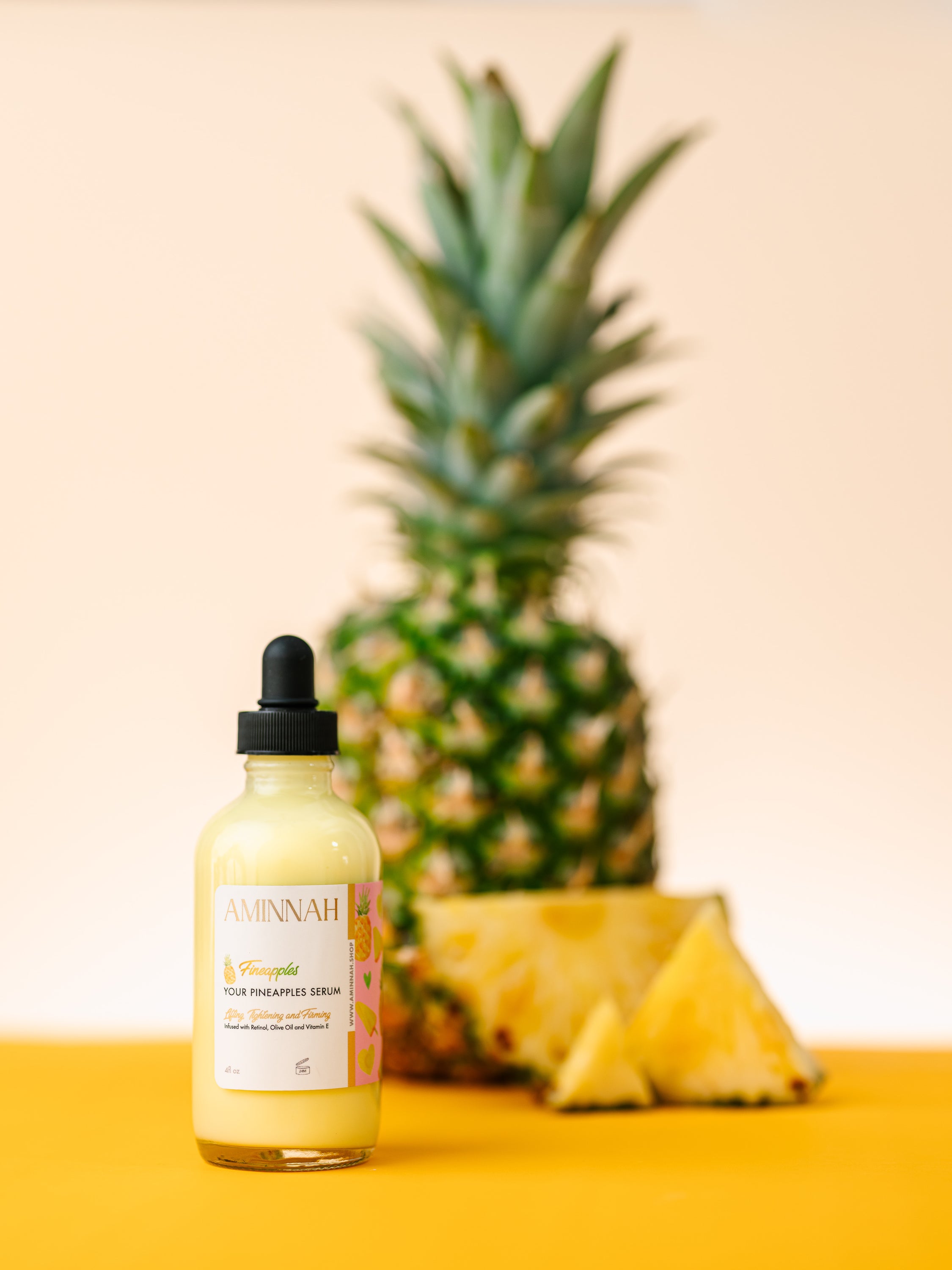 Fineapples Boob Serum bottle with pineapple fruit extract, retinol, and vitamin E ingredients, designed for skin tightening and firming.