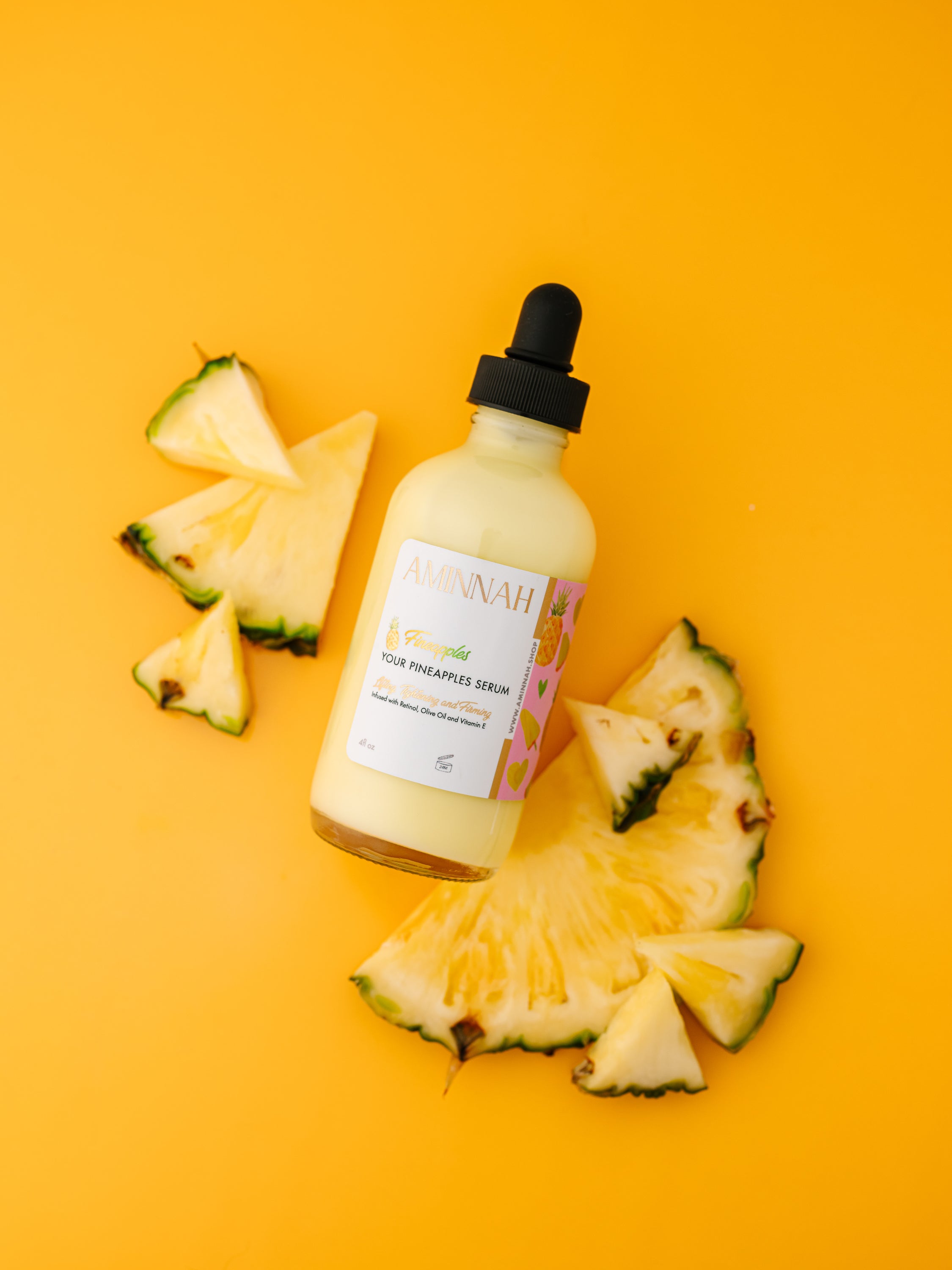 Fineapples Boob Serum bottle with pineapple fruit extract, retinol, and vitamin E ingredients, designed for skin tightening and firming.