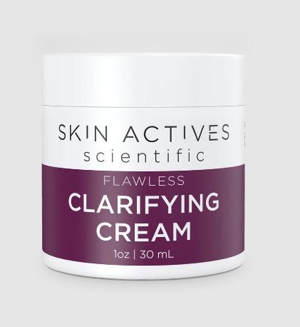 Flawless Clarifying Cream in a 1 fl oz container, designed to target blemishes and reduce breakouts with natural ingredients.