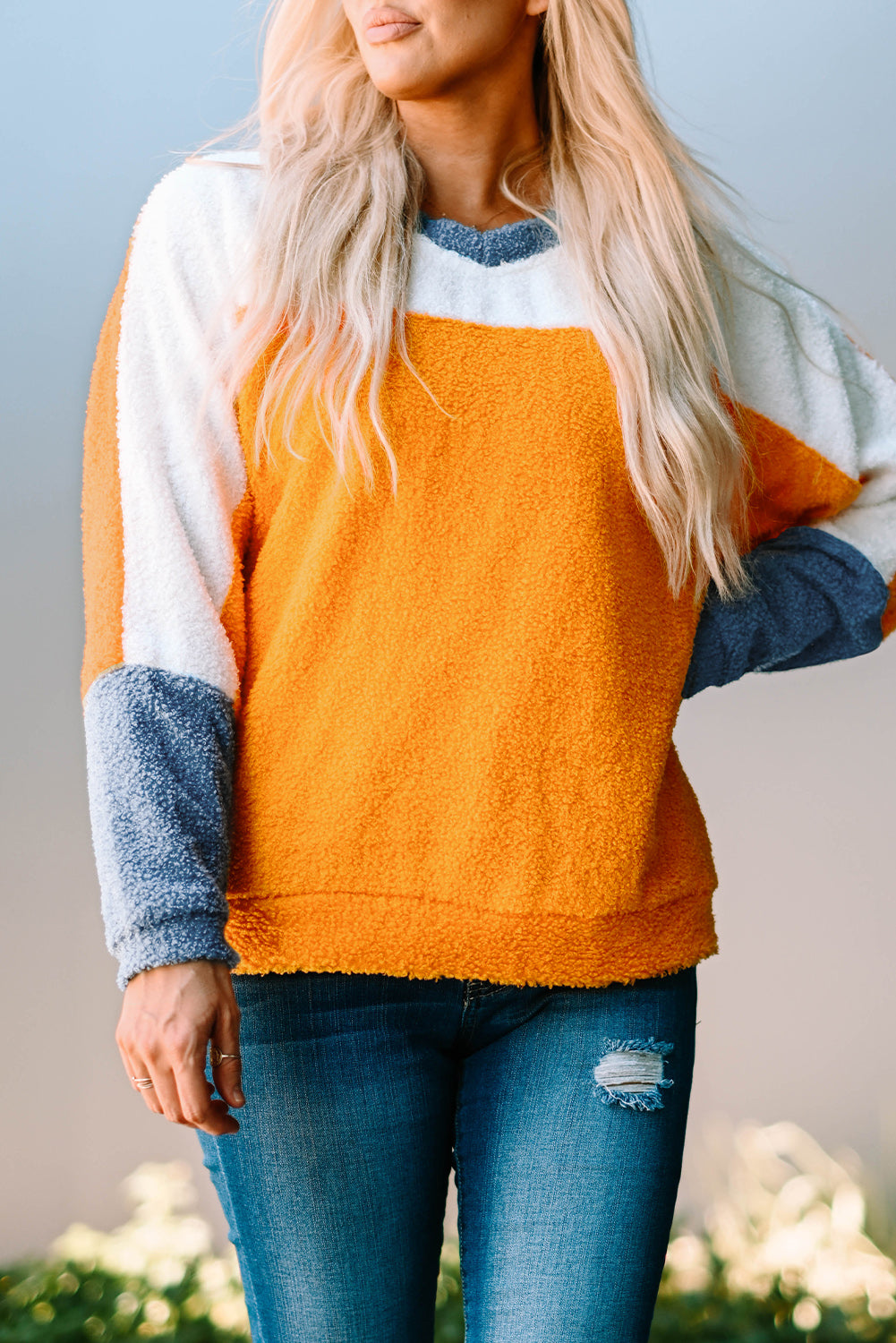 Fleece Colorblock Dolman Sleeves Pullover Top showcasing a mild heart neckline and stylish colorblock design.