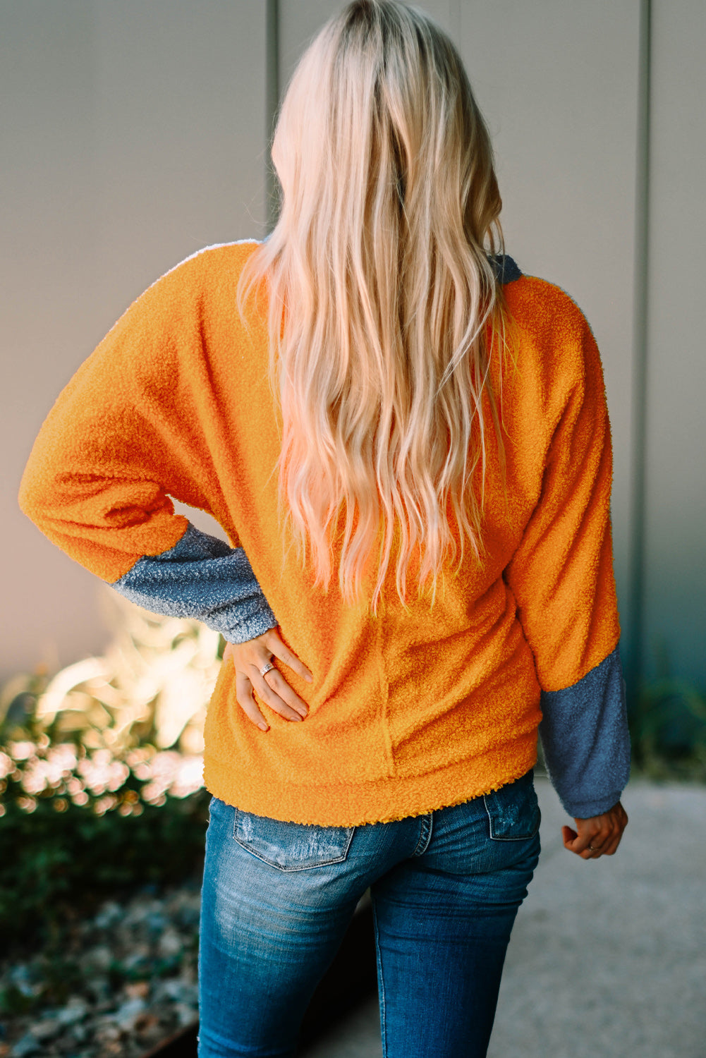 Fleece Colorblock Dolman Sleeves Pullover Top showcasing a mild heart neckline and stylish colorblock design.