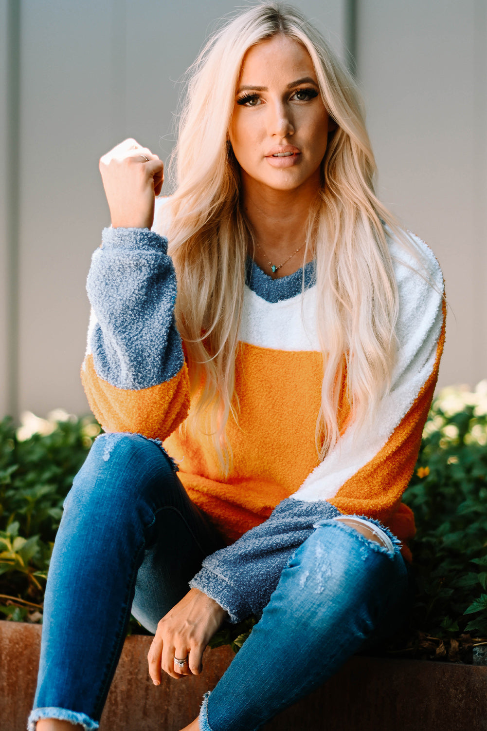 Fleece Colorblock Dolman Sleeves Pullover Top showcasing a mild heart neckline and stylish colorblock design.