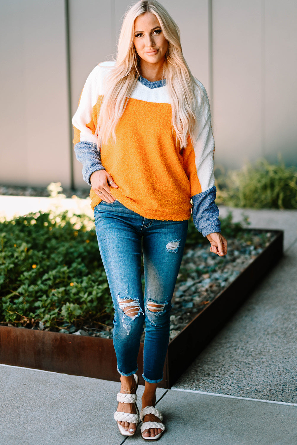 Fleece Colorblock Dolman Sleeves Pullover Top showcasing a mild heart neckline and stylish colorblock design.