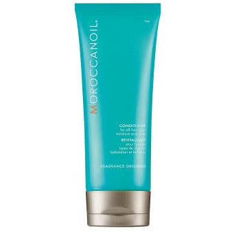 Moroccanoil Fleur D'Oranger Moisture And Shine Conditioner bottle with floral design, showcasing its luxurious packaging.