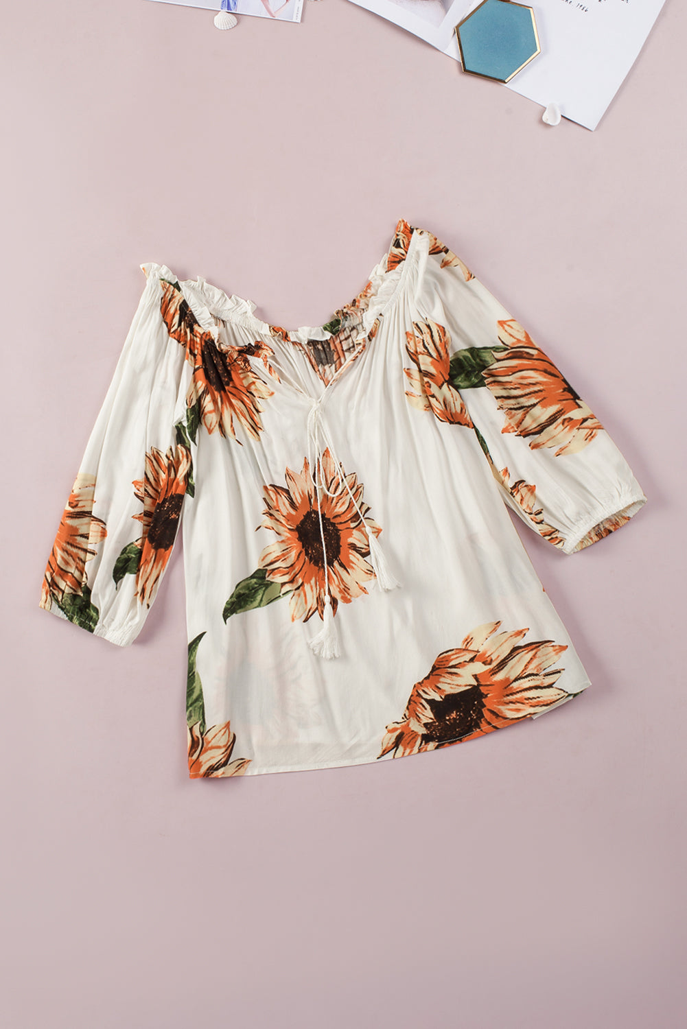 Floral Ruffled Tassel Tie Off Shoulder Blouse featuring sunflower print, ruffles, and tassel ties, perfect for summer styling.