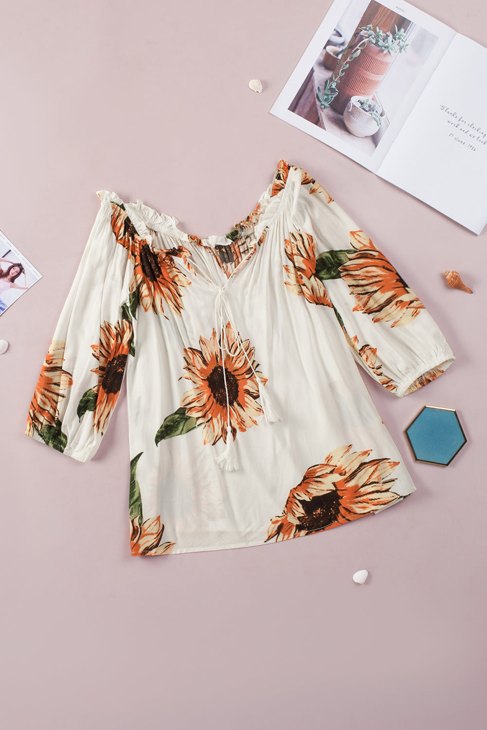 Floral Ruffled Tassel Tie Off Shoulder Blouse featuring sunflower print, ruffles, and tassel ties, perfect for summer styling.