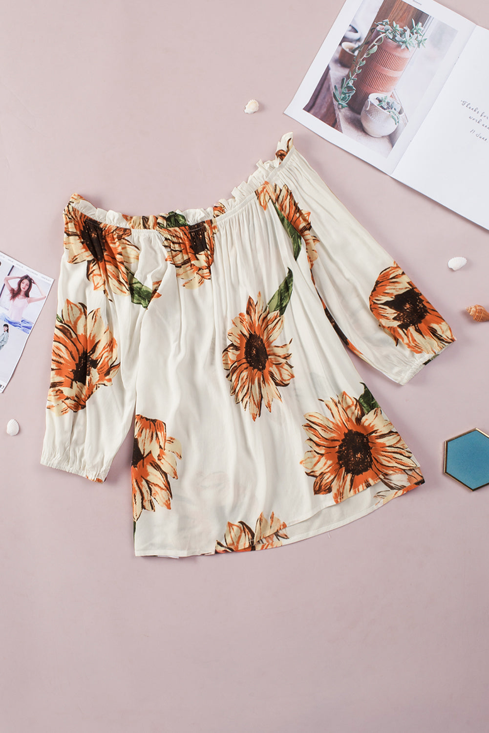 Floral Ruffled Tassel Tie Off Shoulder Blouse featuring sunflower print, ruffles, and tassel ties, perfect for summer styling.