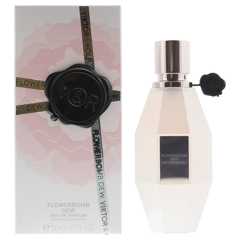 Flowerbomb Dew Eau de Parfum bottle with soft pink hue, elegantly designed for women.