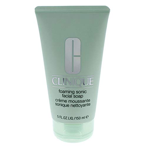 Clinique Foaming Sonic Facial Soap in a sleek bottle, showcasing its foaming texture and branding.