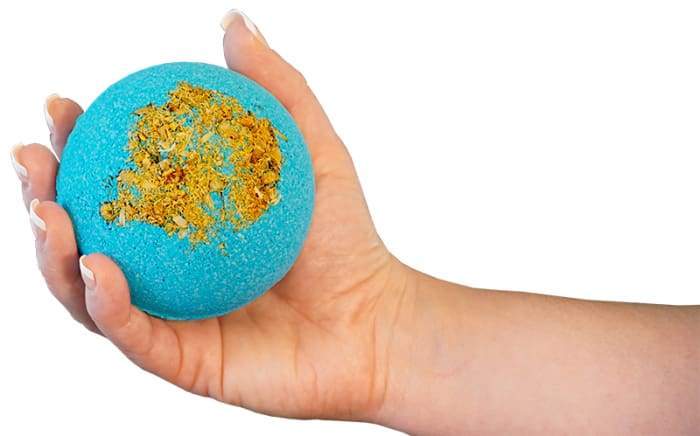 Focus - Bomb Core bath product featuring a vibrant design with essential oils and goat milk soap ball inside.