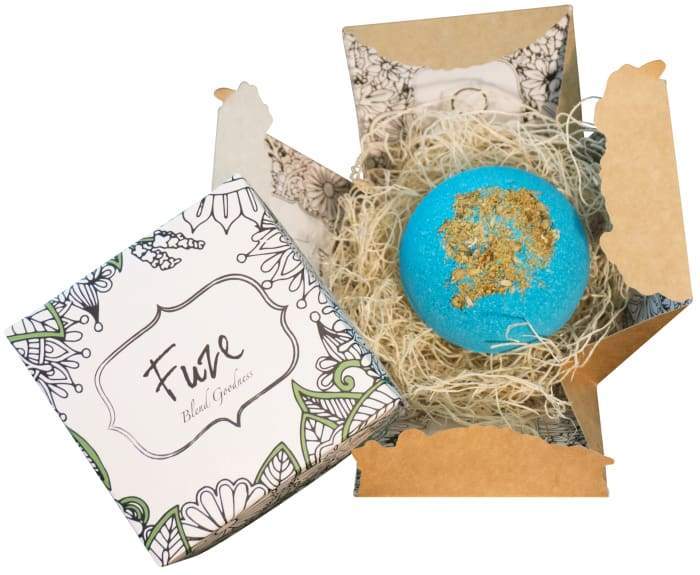 Focus - Bomb Core bath product featuring a vibrant design with essential oils and goat milk soap ball inside.