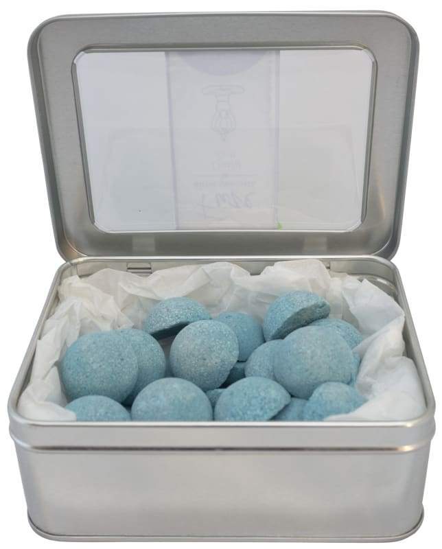 Focus Shower Smoothies 25 Pack with essential oils for hydration and clarity, displayed in a loofah bag.