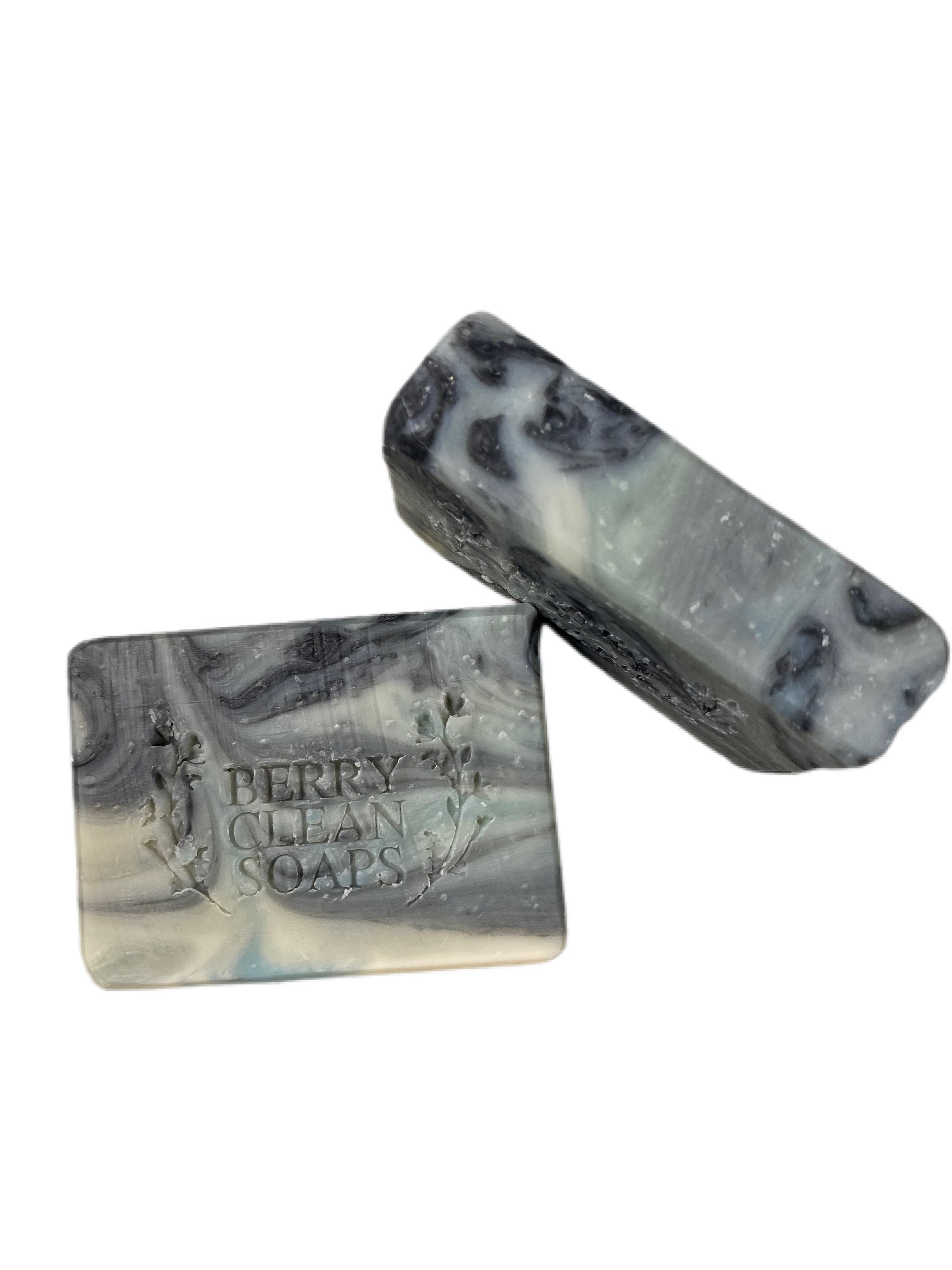 Forest Fresh Activated Charcoal Soap bar with a rich black color and natural texture, showcasing its handcrafted quality and appealing design.